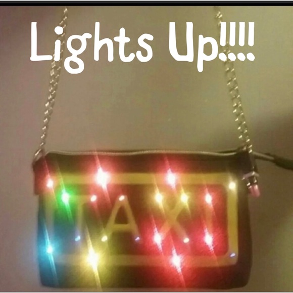 Betsey Johnson Handbags - Betsey Johnson taxi purse lights up